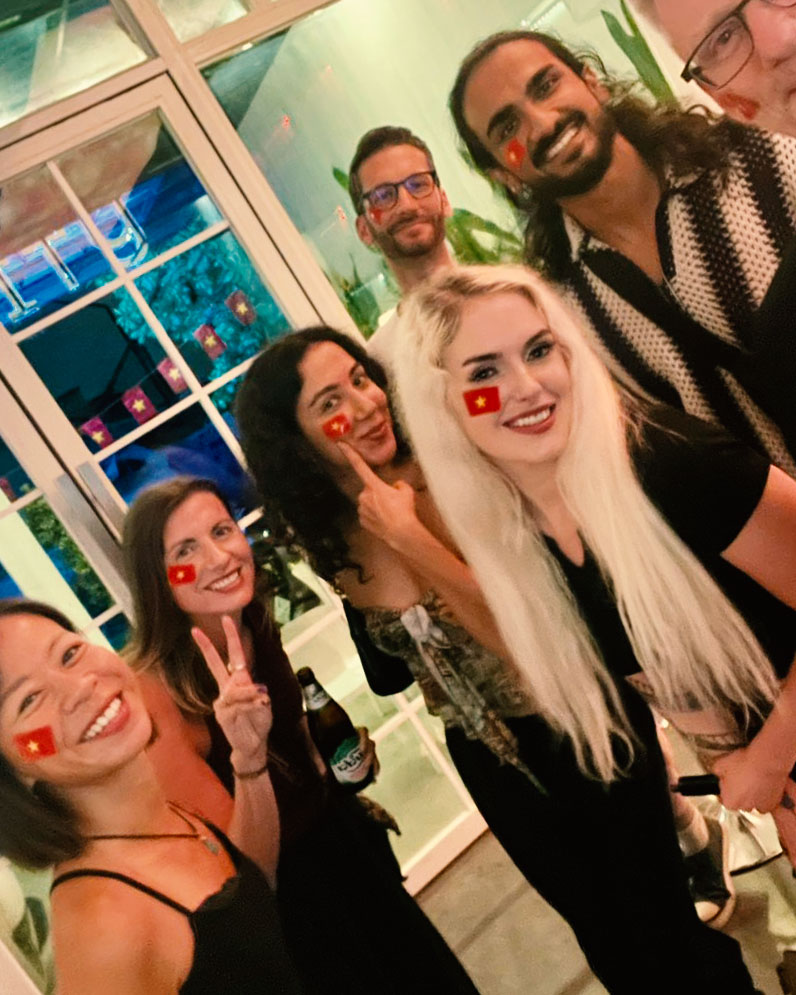 Friends with Vietnam flags on faces