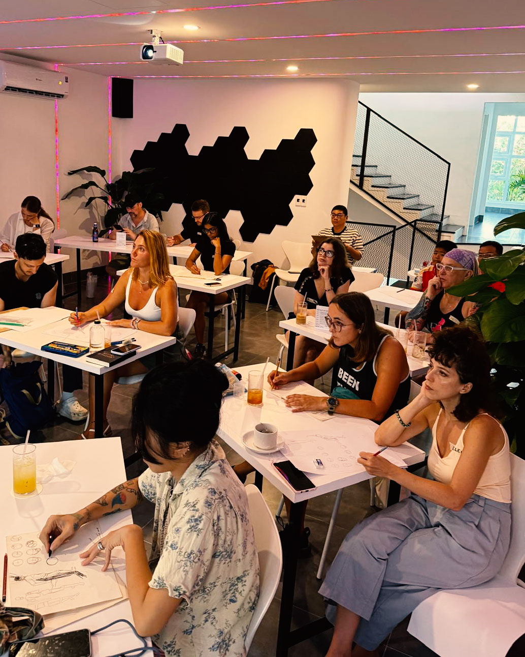 Community drawing workshop at tables