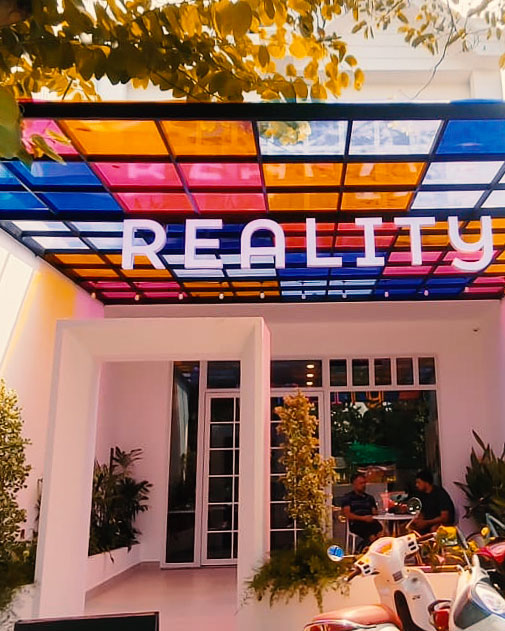 Colorful glass canopy over Reality entrance